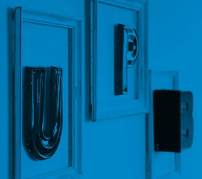Blue picture frames hanging on a wall with the letters
